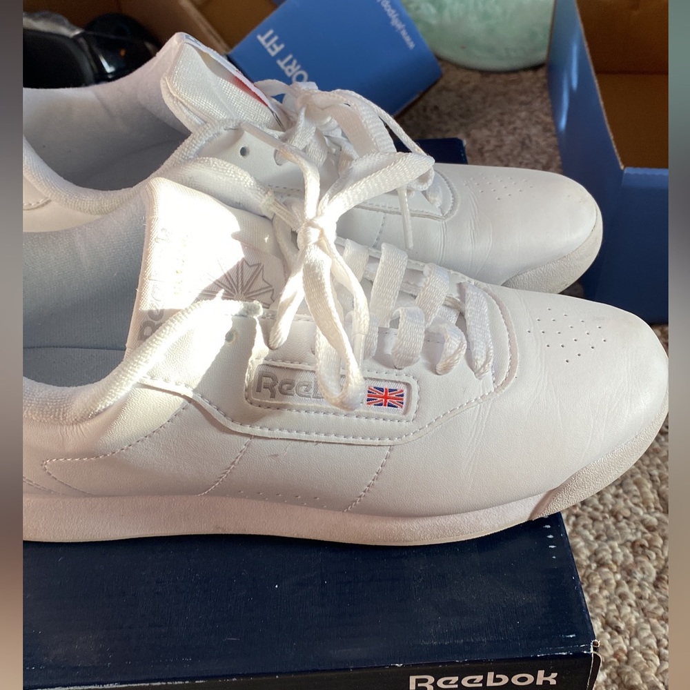 Women white leather Reebok shoes
